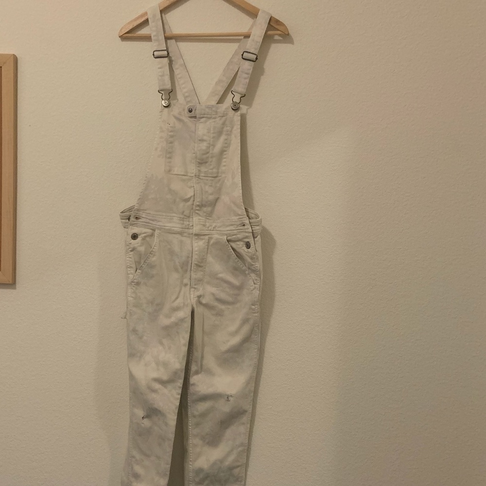 White overalls with floral underparts